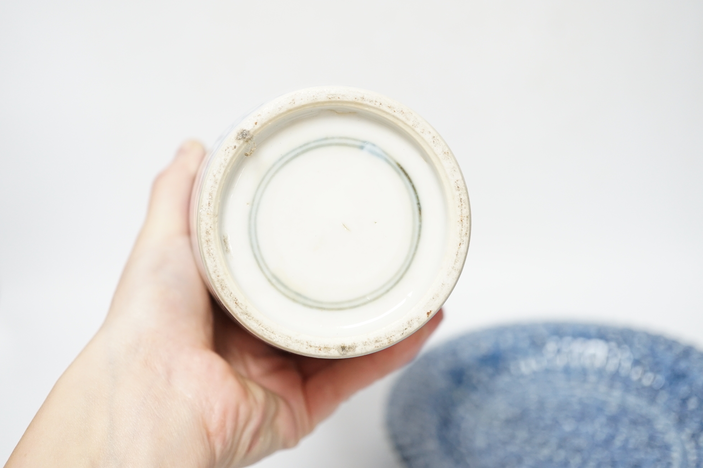 A group of Chinese blue and white dishes and plates and a damaged vase, 30cm